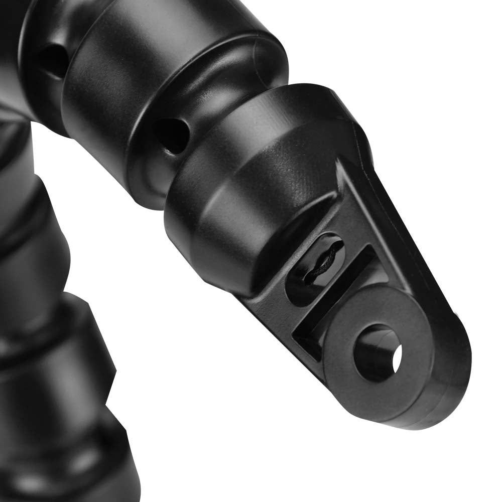 Close-up of a black flexible tripod arm on a white background
